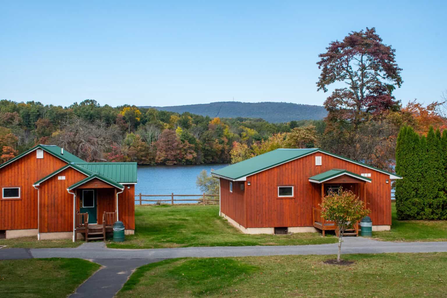 cabins on a lake.