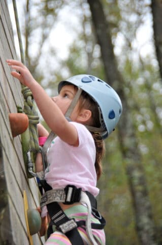 girl on a climbing wall.
