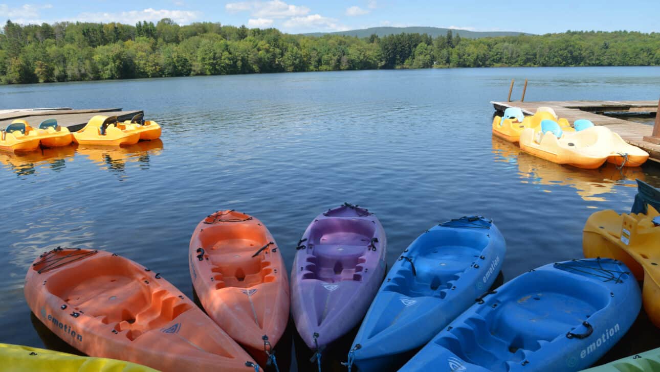 rainbow colored kayaks.