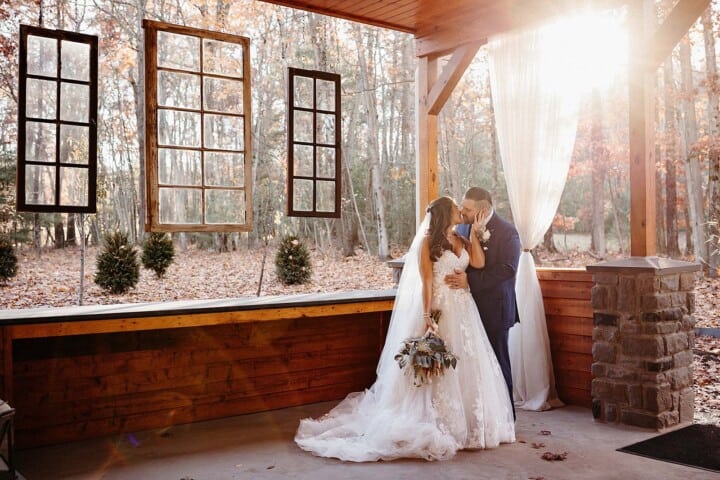 bride and groom on a porch.