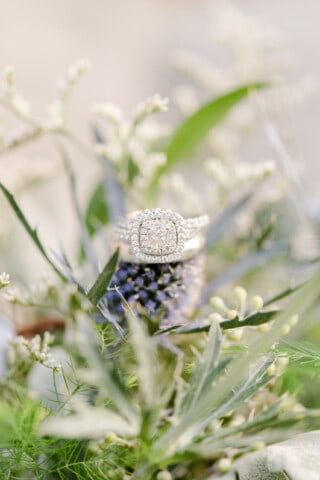 wedding ring in a floral arrangement.
