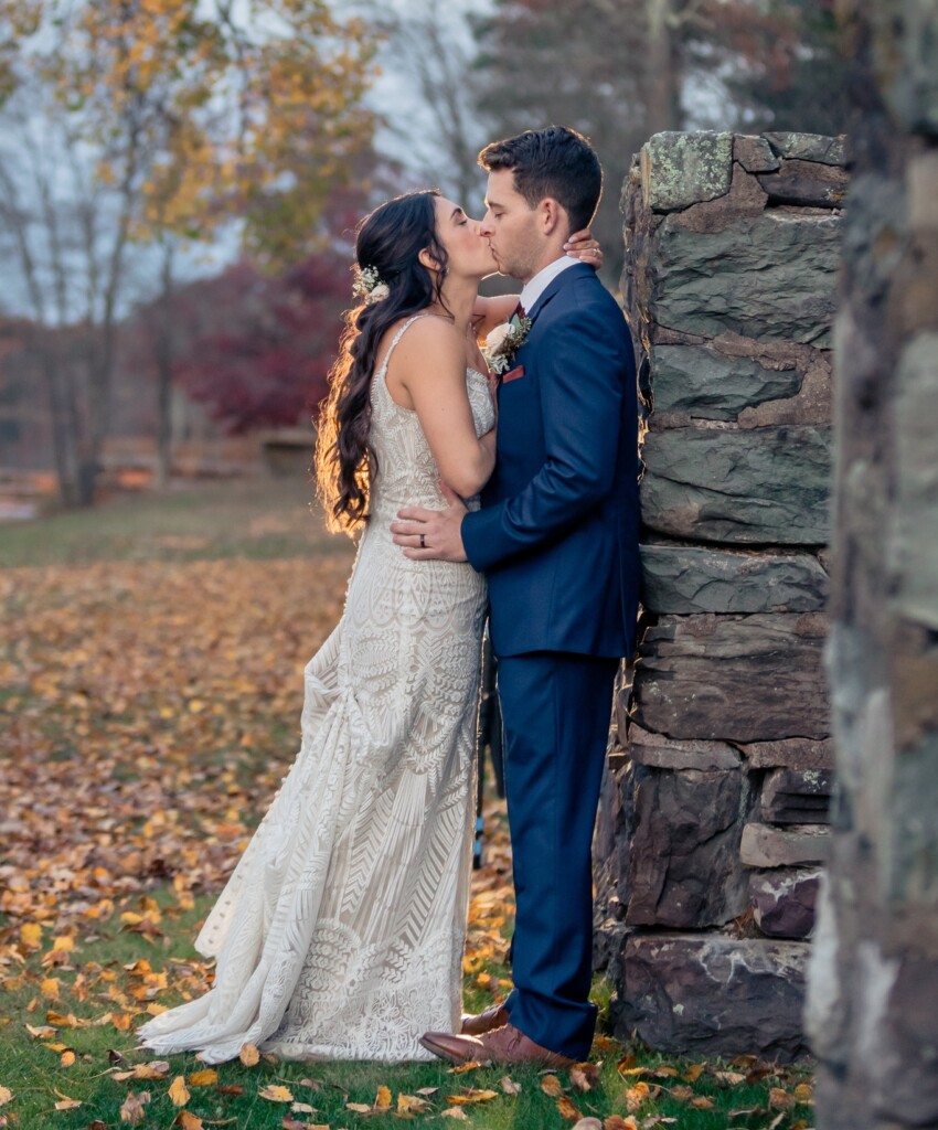 Couple in front of stone walls