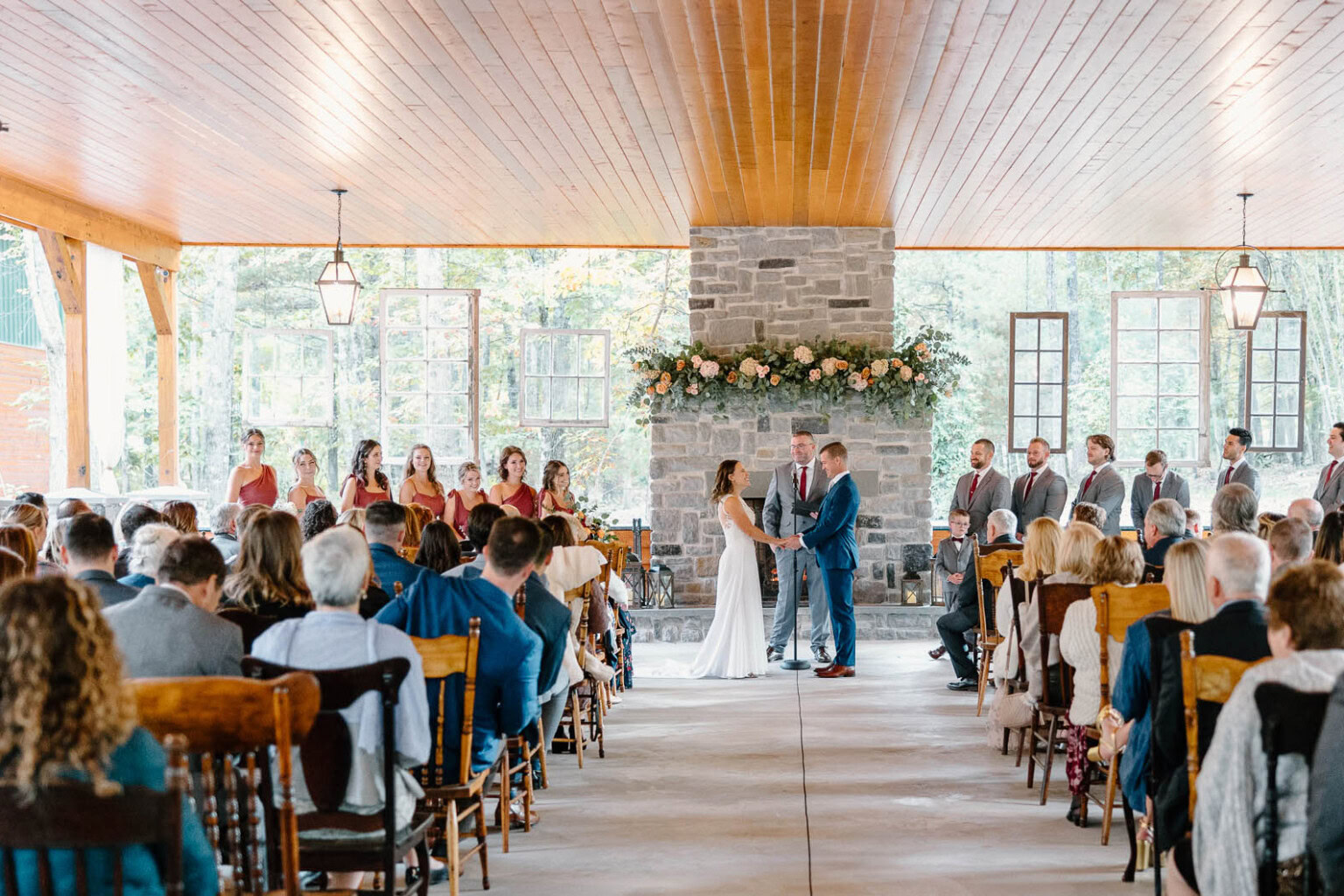 Wedding ceremony in front the pavilion fireplace.