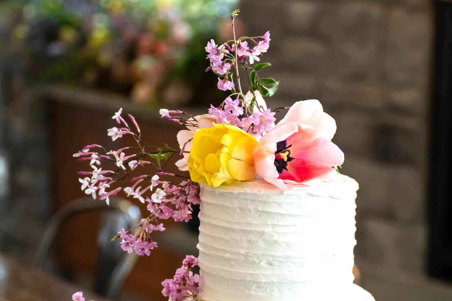 Cake with floral topper.
