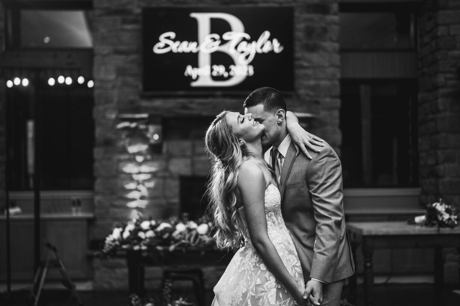 Bride and groom first dance in black and white