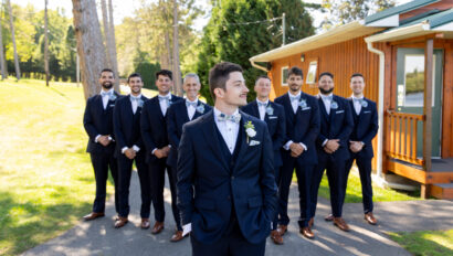 Groom with groomsmen flanking him