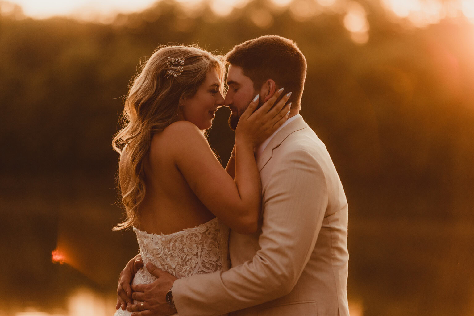 Couple Kissing On The Dock with the lake behind