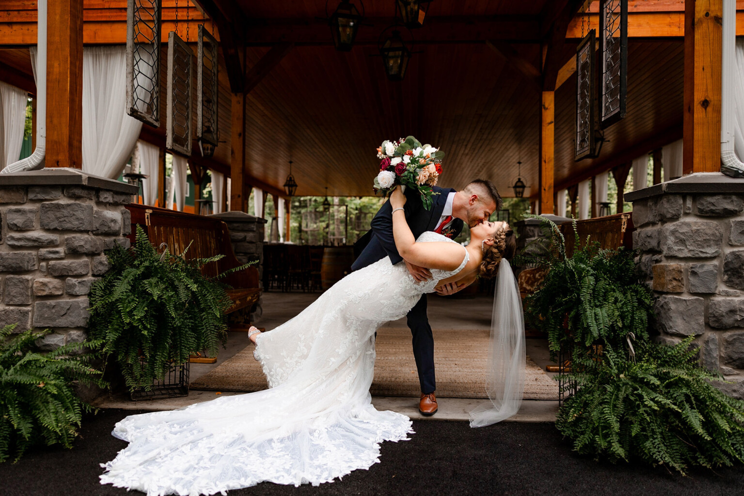 Couple kissing in the Pavilion entryway