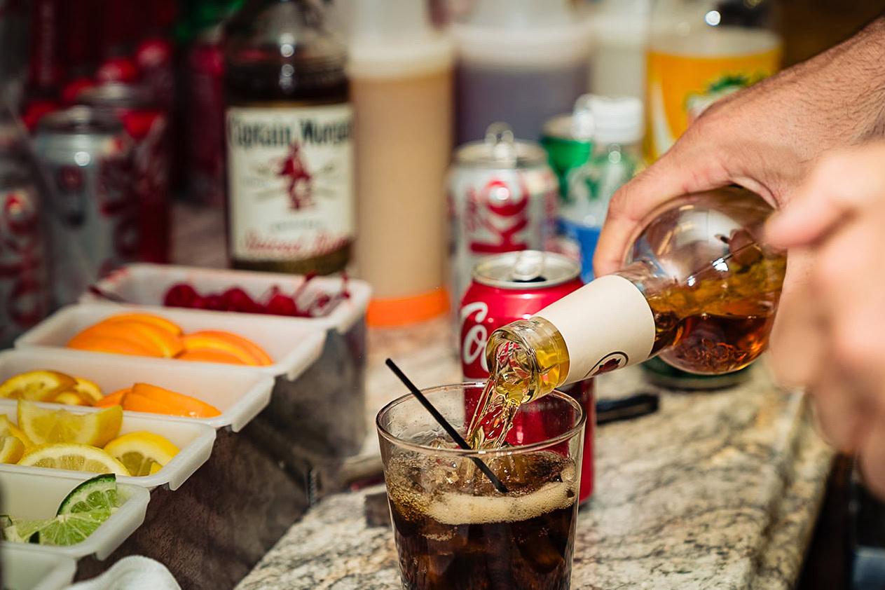 Drink being poured at the bar