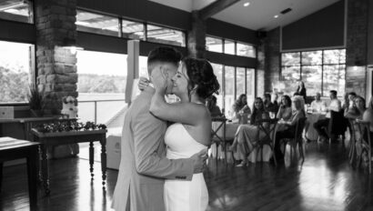 Black and white photo of couple during their first dance.