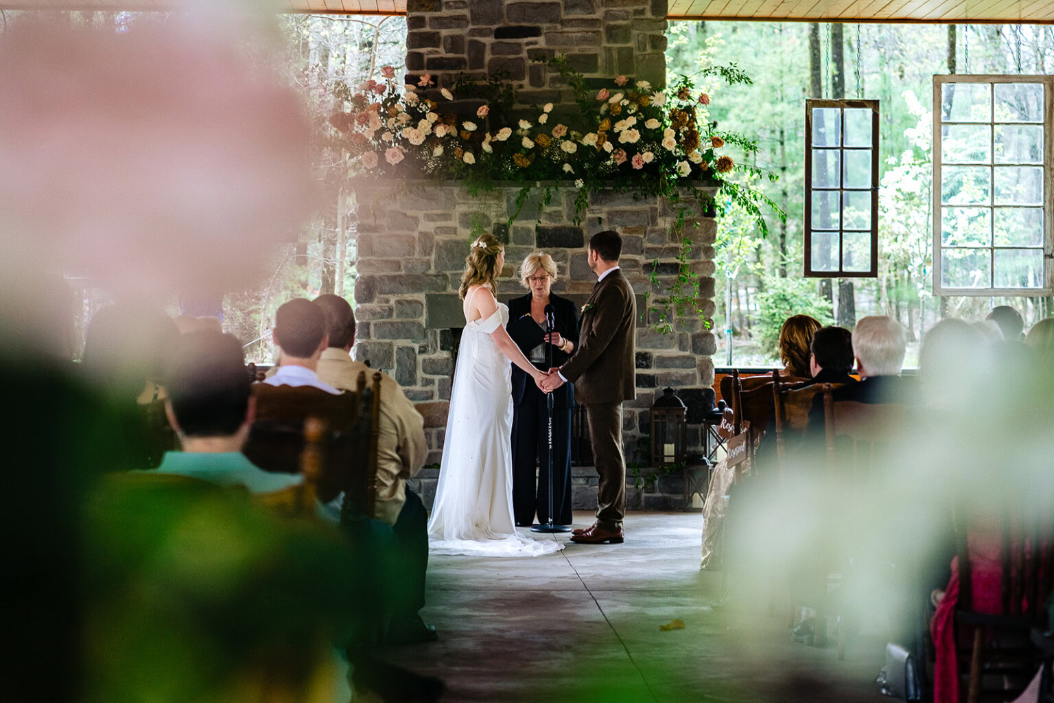 Ceremony in front of the pavilion fireplace.