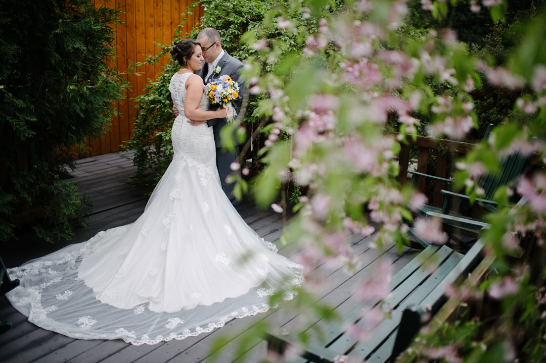 Couple embracing under spring blossoms
