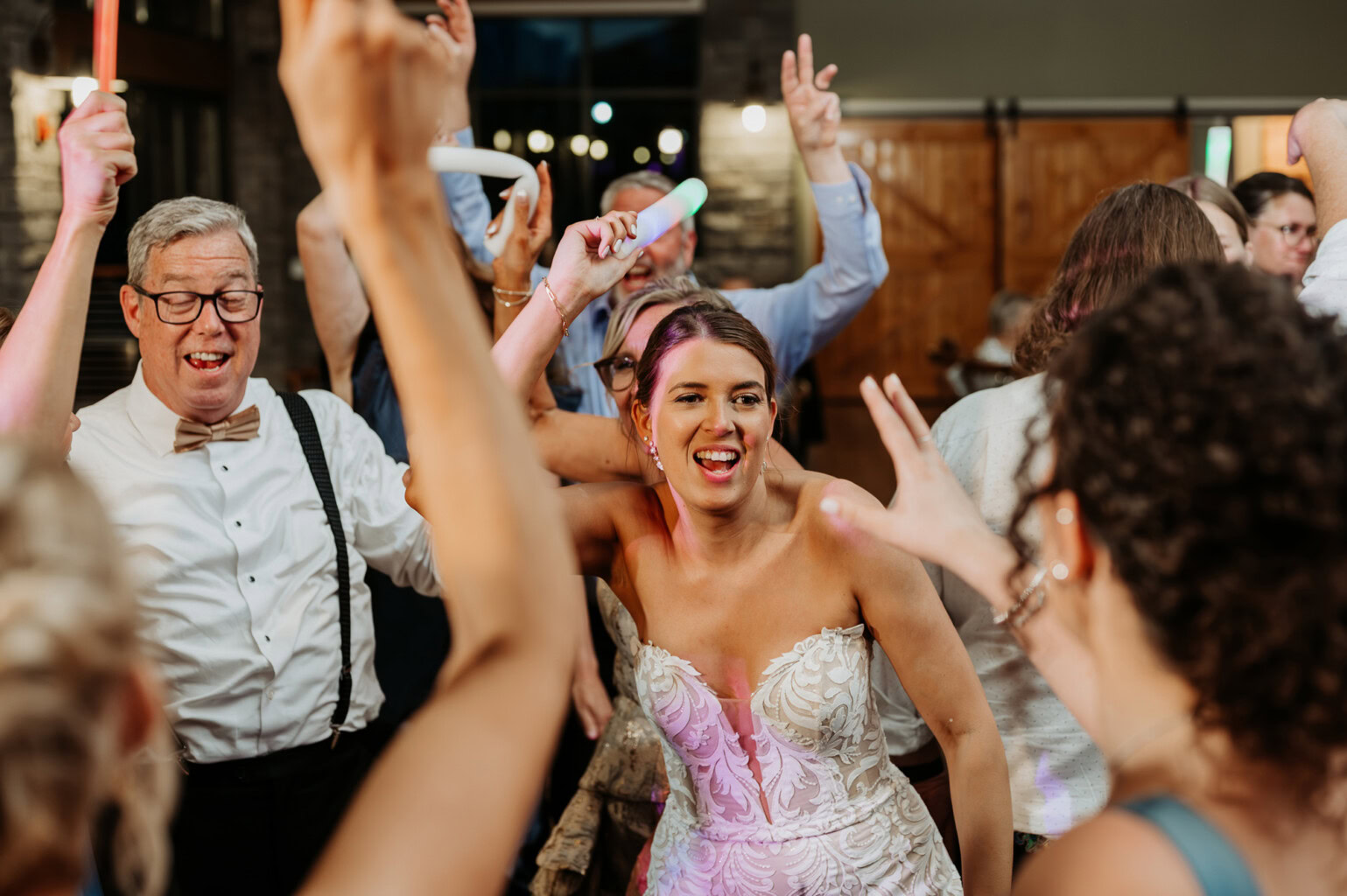 Guests dancing at the reception