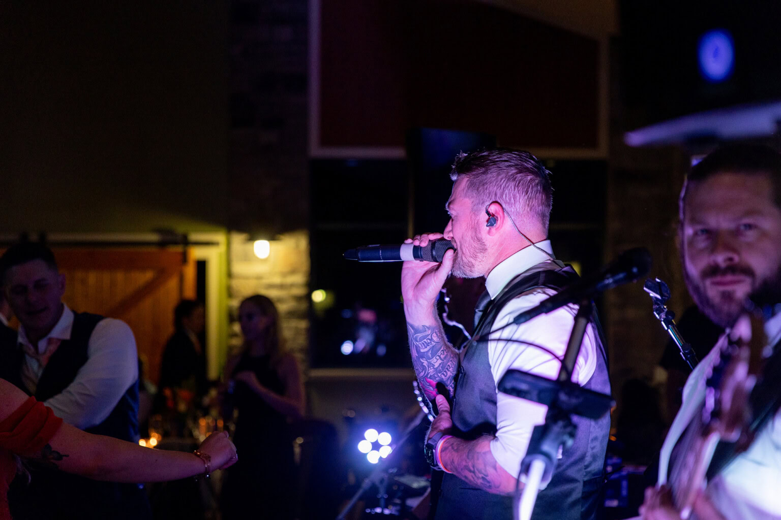 Live band singing at the reception